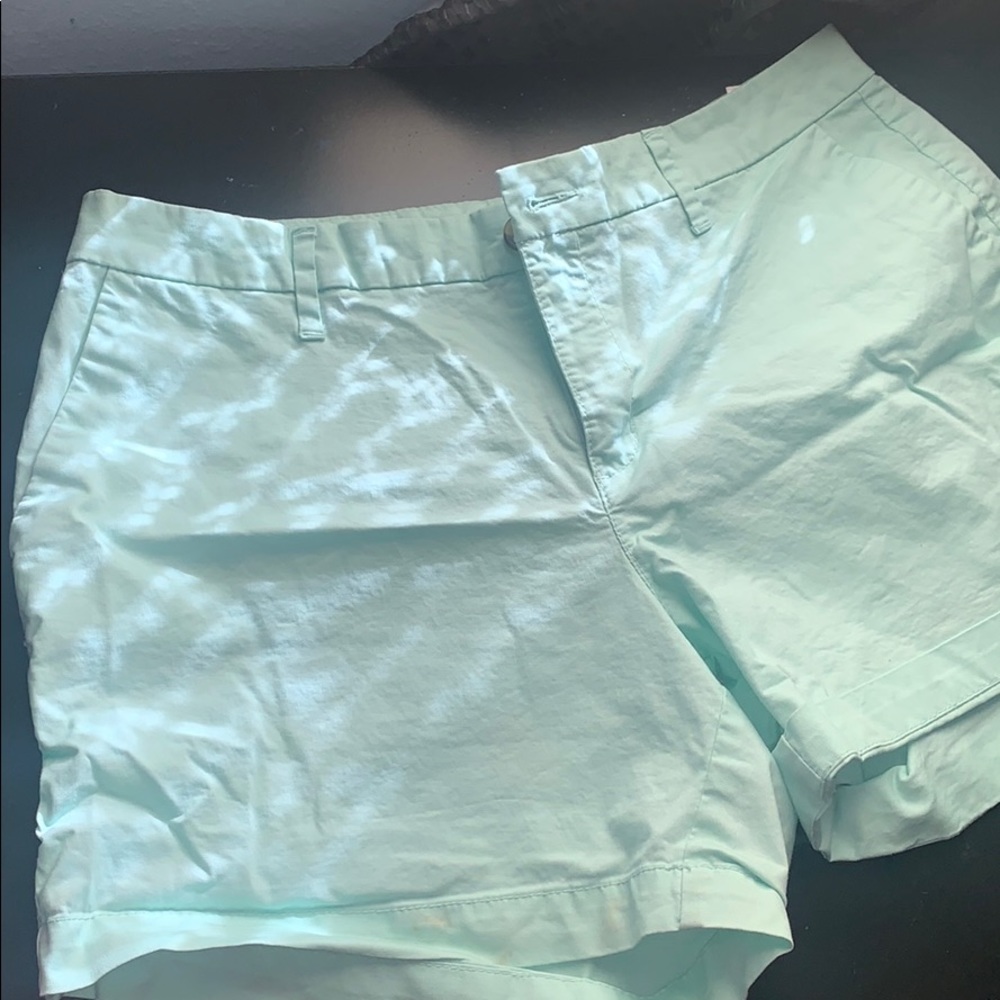 Mint-colored shorts.